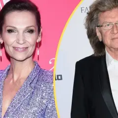 Olga Bończyk i Zbigniew Wodecki, uśmiechnięci i eleganccy, na tle ścianki.