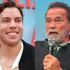 Uśmiechnięty Joseph Baena obok Arnolda Schwarzeneggera przemawiającego do mikrofonu.