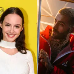 Martyna Byczkowska uśmiecha się na tle żółtej ściany, obok Quebo w czerwonej kurtce.
