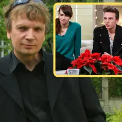 Grzegorz Ciechowski z dziećmi, młodą kobietą i mężczyzną, siedzą przy stole z gwiazdą betlejemską.