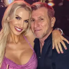Aneta Glam z partnerem, uśmiechnięci, w eleganckim wnętrzu.