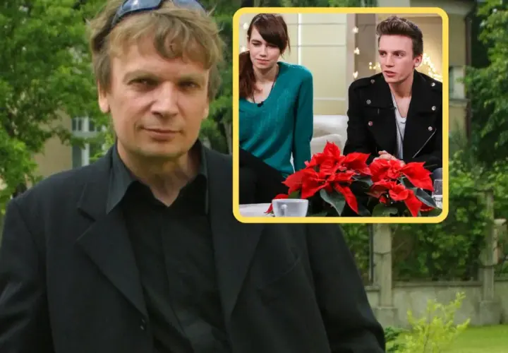 Grzegorz Ciechowski z dziećmi, młodą kobietą i mężczyzną, siedzą przy stole z gwiazdą betlejemską.