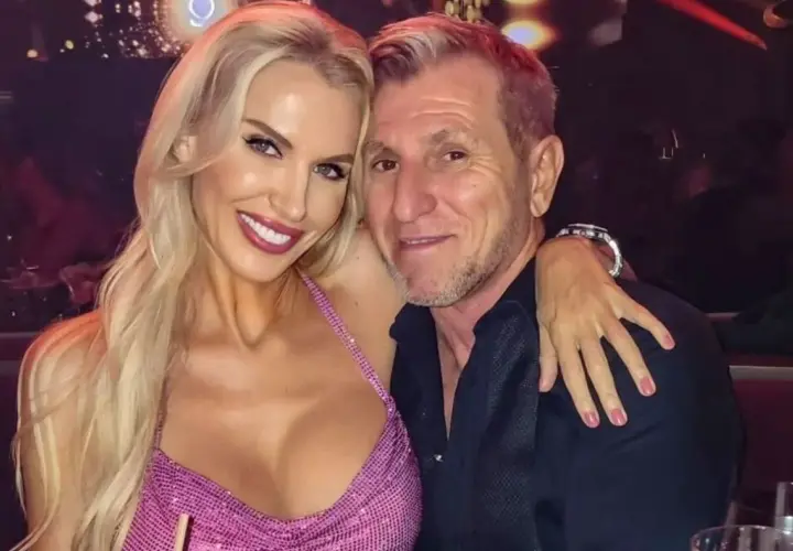 Aneta Glam z partnerem, uśmiechnięci, w eleganckim wnętrzu.
