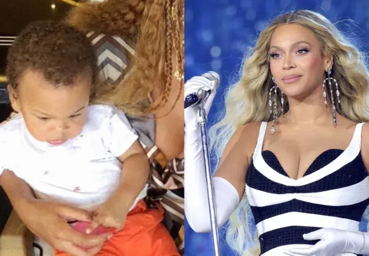 Mały sir Carter w białej koszulce i pomarańczowych spodenkach, obok Beyoncé w błyszczącej sukience.
