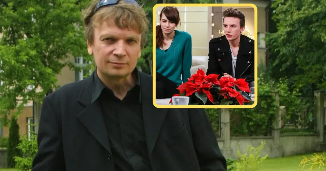 Grzegorz Ciechowski z dziećmi, młodą kobietą i mężczyzną, siedzą przy stole z gwiazdą betlejemską.