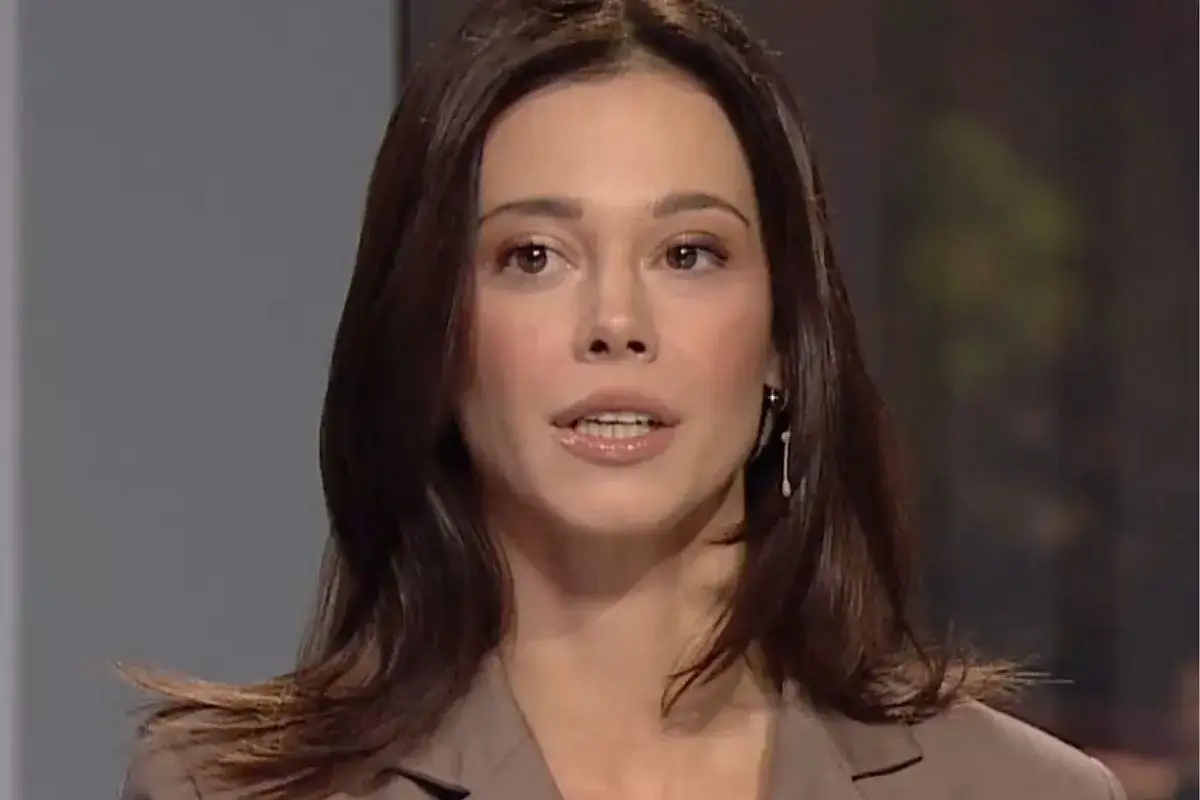 Marta Abramczyk, wiek nieznany, w brązowej marynarce, z ciemnymi włosami i delikatnym makijażem.